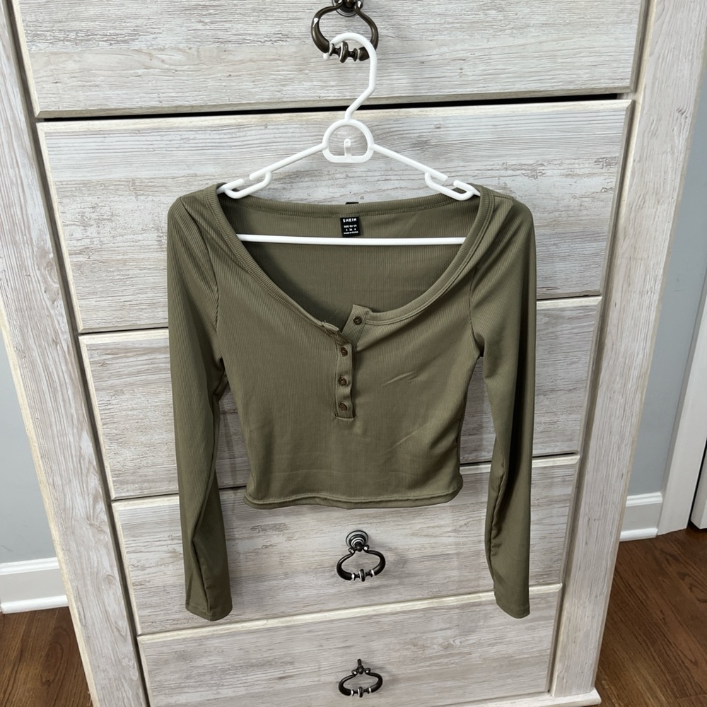 green half-button long sleeve top